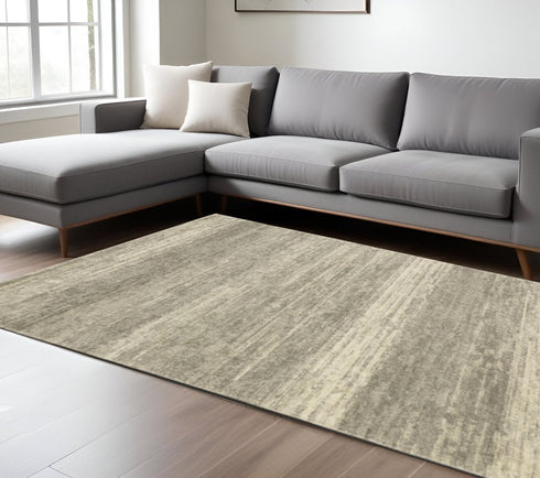 3' X 5' Grey Beige And Tan Abstract Power Loom Stain Resistant Area Rug